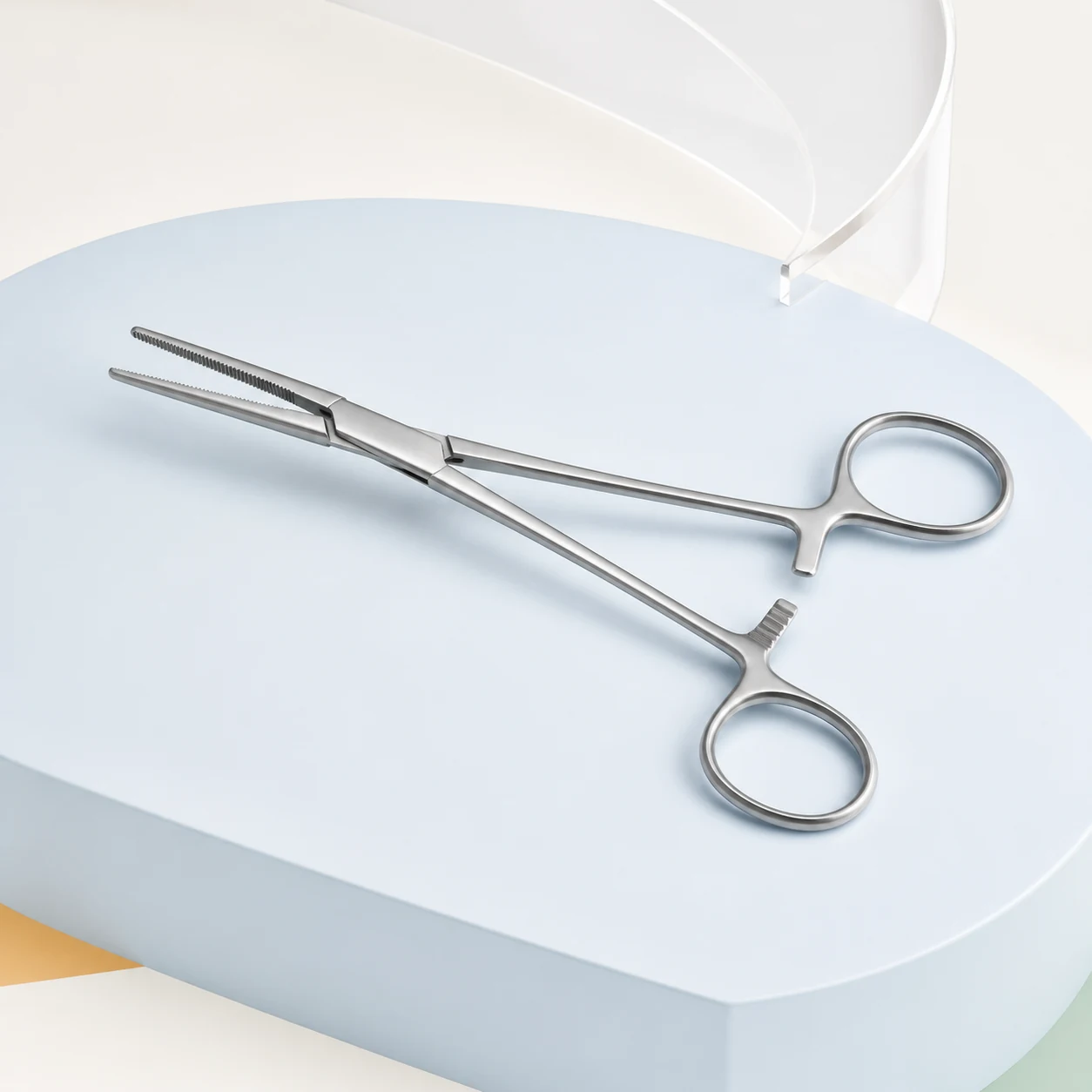 Stainless hemostatic clamp on clinical fabric